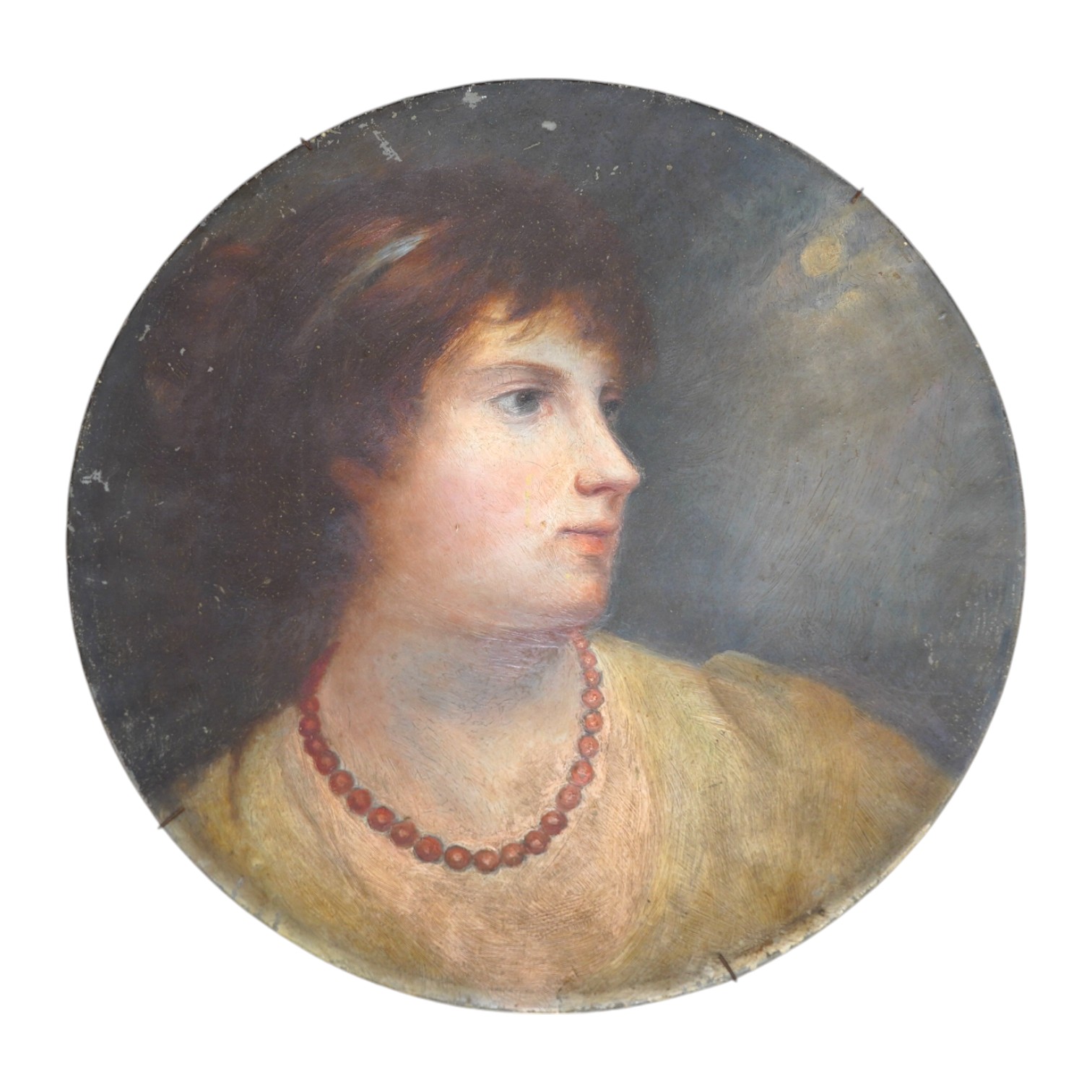 Victorian School, oil on pewter charger, Head and shoulders portrait of a lady wearing a coral necklace, 36cm diameter. Condition - fair